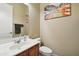 Powder room with single vanity and toilet at 18311 W East Wind Ave, Goodyear, AZ 85338