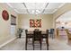 Open concept dining room with a view of the kitchen and living area at 18311 W East Wind Ave, Goodyear, AZ 85338