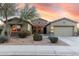 Beautiful two-story home with landscaping and driveway at 18311 W East Wind Ave, Goodyear, AZ 85338