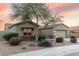 House with desert landscaping and stone accents at 18311 W East Wind Ave, Goodyear, AZ 85338