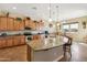 Large kitchen with granite countertops and modern appliances at 18311 W East Wind Ave, Goodyear, AZ 85338