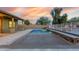 Clean lines and modern appeal of this pool at 18311 W East Wind Ave, Goodyear, AZ 85338