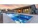 Luxury pool with spa and outdoor seating at 18311 W East Wind Ave, Goodyear, AZ 85338