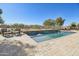 Inviting pool with spa and expansive patio area at 18311 W East Wind Ave, Goodyear, AZ 85338