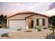 One-story home with two-car garage and desert landscaping at 1835 Broken Arrow Dr, Wickenburg, AZ 85390