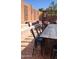 Large patio table with seating and built-in bench at 18656 W Raymond St, Goodyear, AZ 85338