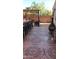 Outdoor patio with seating, fire pit, and pergola at 18656 W Raymond St, Goodyear, AZ 85338