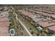 Aerial view of neighborhood with community pathway and pools at 19447 S 209Th Pl, Queen Creek, AZ 85142