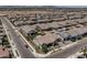 Aerial view of homes and neighborhood with a street at 19447 S 209Th Pl, Queen Creek, AZ 85142