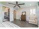 Main bedroom with ensuite bathroom, walk-in closet, and sitting area at 19447 S 209Th Pl, Queen Creek, AZ 85142