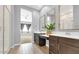 Double vanity bathroom with large mirrors and modern fixtures at 19583 W Cheery Lynn Rd, Buckeye, AZ 85396