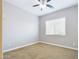 Simple bedroom with neutral walls and carpet flooring at 19583 W Cheery Lynn Rd, Buckeye, AZ 85396