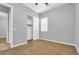 Spacious bedroom with neutral walls and carpeted floor at 19583 W Cheery Lynn Rd, Buckeye, AZ 85396