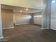 Spacious 3-car garage with epoxy flooring and high ceilings at 19583 W Cheery Lynn Rd, Buckeye, AZ 85396