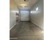 Spacious garage with large door and ample space for parking and storage at 19583 W Cheery Lynn Rd, Buckeye, AZ 85396