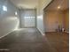 Large garage with high ceilings and extra storage space at 19583 W Cheery Lynn Rd, Buckeye, AZ 85396