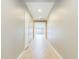 Bright hallway with light tile floors leading to other rooms at 19583 W Cheery Lynn Rd, Buckeye, AZ 85396