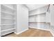 Spacious walk-in closet with ample shelving and hanging rods at 19583 W Cheery Lynn Rd, Buckeye, AZ 85396