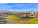 Aerial view of community with mountain views, park, and homes at 19780 E Ivy Ln, Queen Creek, AZ 85142