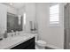 Bathroom with shower and modern vanity at 19780 E Ivy Ln, Queen Creek, AZ 85142