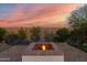 Cozy fire pit area with seating for relaxing evenings at 19780 E Ivy Ln, Queen Creek, AZ 85142