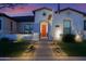 Elegant single story home with a welcoming front porch at 19780 E Ivy Ln, Queen Creek, AZ 85142