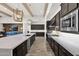 Large kitchen island with breakfast bar and modern appliances at 19780 E Ivy Ln, Queen Creek, AZ 85142