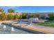 Relaxing pool area with fire pit and loungers at 19780 E Ivy Ln, Queen Creek, AZ 85142