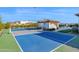 Private backyard with a pickleball and basketball court at 19780 E Ivy Ln, Queen Creek, AZ 85142