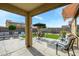 Cozy backyard patio with seating area and retractable awning at 20017 W Jackson St, Buckeye, AZ 85326