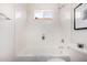 Simple bathroom featuring a bathtub and shower at 2018 E Glenhaven Dr, Phoenix, AZ 85048