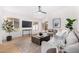 Bright and airy living room featuring light floors and modern decor at 2018 E Glenhaven Dr, Phoenix, AZ 85048