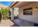 Small patio area with shrubbery at 2018 E Glenhaven Dr, Phoenix, AZ 85048