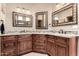 Bathroom with dual vanity and granite countertops at 20426 N 133Rd Dr, Sun City West, AZ 85375