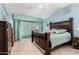 Bright bedroom with a king-size bed and ensuite bathroom at 20426 N 133Rd Dr, Sun City West, AZ 85375