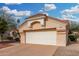 Two-car garage with an attached carport at 20426 N 133Rd Dr, Sun City West, AZ 85375