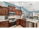 Well-equipped kitchen with stainless steel appliances at 20426 N 133Rd Dr, Sun City West, AZ 85375