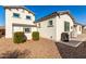 Backyard featuring a storage shed, greenery, and desert landscaping at 22901 E Quintero Rd, Queen Creek, AZ 85142