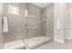 Bathroom featuring large glass shower enclosure, rain shower head, and white hexagonal tile floor at 22901 E Quintero Rd, Queen Creek, AZ 85142