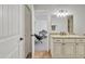 Bathroom with granite countertop, white cabinets, and tiled floor at 2344 N Raven --, Mesa, AZ 85207