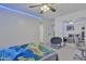 Bedroom with a bed, chair, and mirrored closet at 2344 N Raven --, Mesa, AZ 85207