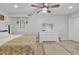 Main bedroom with a dresser, ceiling fan, and patterned rug at 2344 N Raven --, Mesa, AZ 85207