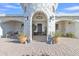 Elegant entryway with arched doorway and chandelier at 2344 N Raven --, Mesa, AZ 85207