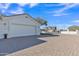 White garage door with brick paver driveway at 2344 N Raven --, Mesa, AZ 85207