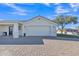 White garage door with brick paver driveway at 2344 N Raven --, Mesa, AZ 85207