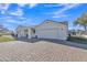 Front view of a remodeled home with a covered patio at 2344 N Raven --, Mesa, AZ 85207