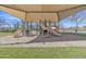 Community playground with shaded play structure and slides at 2344 N Raven --, Mesa, AZ 85207