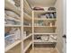 Well-organized storage room with ample shelving at 2344 N Raven --, Mesa, AZ 85207