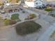 Aerial view of backyard with a hot tub and lush landscaping at 23699 N Oasis Blvd, Florence, AZ 85132