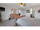 Spacious bedroom with ensuite bathroom access and built-in dresser at 23699 N Oasis Blvd, Florence, AZ 85132